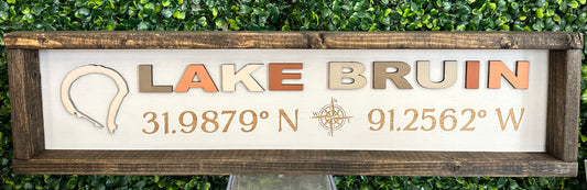 Lake Bruin in color with coordinates sign